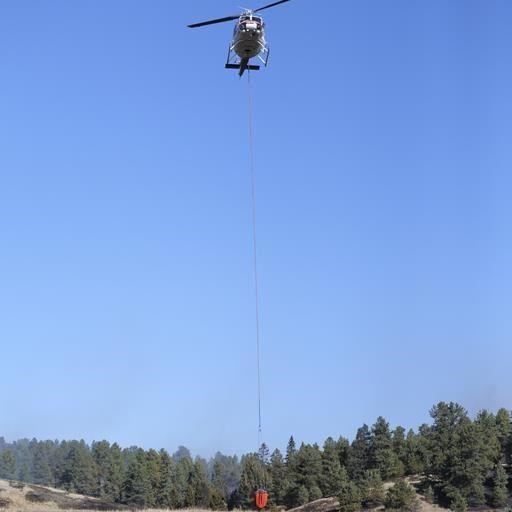 Fire destroys 1 home and forces the evacuation of 700 others in a Colorado subdivision